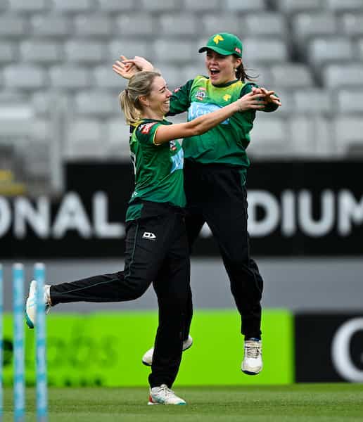 Claudia Green and Flora Devonshire of the Central Hinds celebrate the dismissal of Kasperek during the Dream11 Super Smash T20 Womens Cricket Final. Eden Park, Auckland, New Zealand. Sunday 28 January 2024. Photo credit: Andrew Cornaga / www.photosport.nz