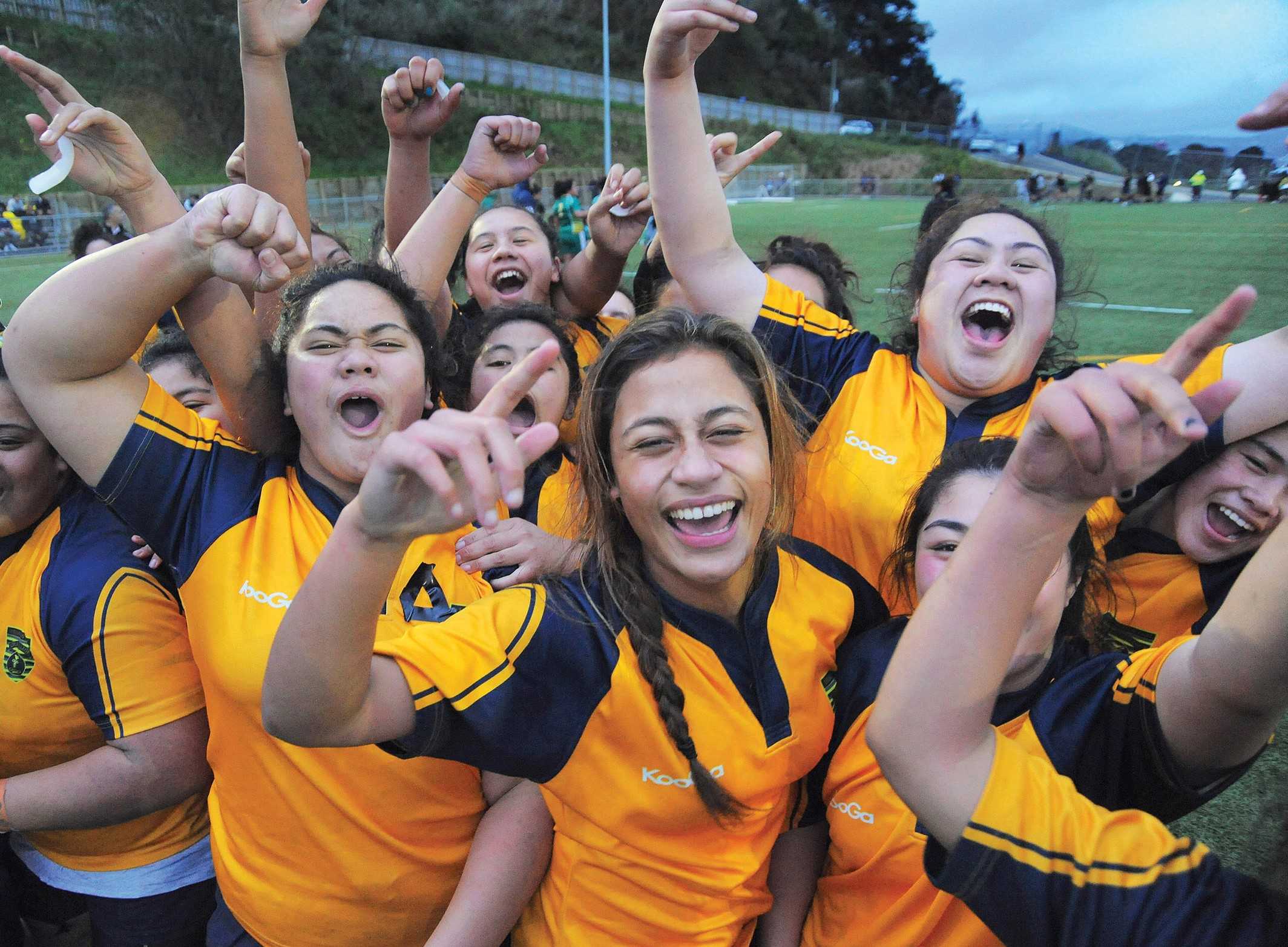 The WEGS team celebrates winning the Wellington girls college division two rugby final between Wellington East Girls School and Mana College at Te Whaea, Wellington, New Zealand on Thursday, 8 August 2013. Photo: Dave Lintott / lintottphoto.co.nz
